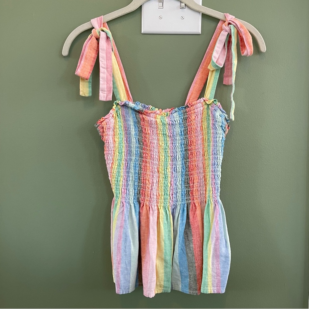 Rainbow tank top with tie straps and elasticized upper.